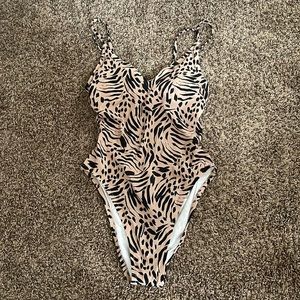 Neutral Print Low Coverage One Piece / Size L (12-14)